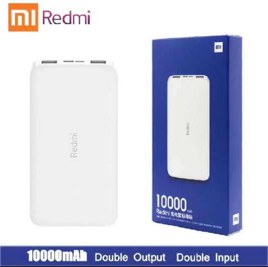 Close-up of Mi Redmi Power Bank displaying dual USB output and Type-C/Micro-USB input ports for fast charging